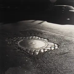 Blocked Manhole by Bruce Cratsley, 1990, photograph, offered Nov 2024