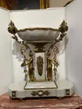 Untitled by White Porcelain, bronze centerpiece, offered Aug 2026