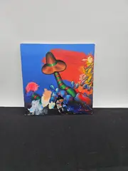 Description: Vibrant surreal composition featuring a central mushroom form surrounded by colorful abstract shapes and expressive brushwork in bold red by Dionsio Blanco, Oil on Canvas, offered Aug 2026