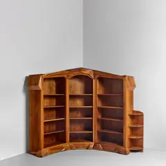 Anthroposophical Bookcase by Siegfried Pütz, polished and chip-carved walnut, printed ink mark 'GECHINGER WERKSTATTE SIEGFRIED PUTZ GECHINGEN', offered Sep 2025