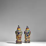Th.A.C. Colenbrander, Pair of Vases and Covers, 's-Gravenhaagse Kunstaardewerkfabriek, glazed earthenware, painted mark 'WvG Haag', year letter 'B' for 1886