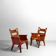 Herman Devries, Pair of 'Heart' Armchairs, for Cushman Colonial Creation, carved maple, metal tag 'A Genuine Cushman COLONIAL Creation made in BENNINGTON, VT