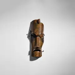 Siem van den Hoonaard, Wall Mask, handcut and bent patinated copper
