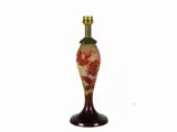 An Early 20th Century Cameo Glass Table Lamp Base by Émile Gallé, 1846, decorato con motivi floreali nei toni del rosa e del viola, offered Mar 2018