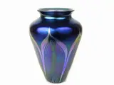 A Late 19th Century Favrile Glass Vase by Louis Comfort Tiffany, 1848, decorato con motivo di piume di pavone stilizzate, offered Mar 2018