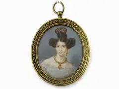 Two Miniatures by Giorgio Banchi, 1789, Portrait of a Lady with a Tortoise Shell Comb in Her Hair and Portrait of a Gentleman two oval miniatures on ivory, offered May 2017