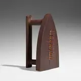 Cadeau by Man Ray, cast iron, steel tacks, sold Dec 2022