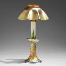 Pulled Feather candle lamp by Tiffany Studios, c. 1908, hand-blown Favrile glass, brass, sold Mar 2023