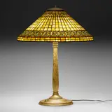 Greek Key table lamp by Tiffany Studios, c. 1910, leaded glass, patinated bronze, sold Mar 2023