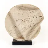 Henry Bursztynowicz, Splitting Disc II (Folded Slab Number 45), 1983, polished and, carved travertine marble on slate base