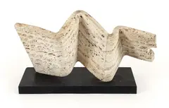 Pennant, Folded Slab No. 15, aka Folded and Rolled Wall, 1979, polished and by Henry Bursztynowicz, carved travertine marble on a slate base, offered Apr 2024