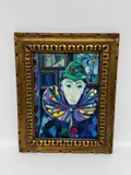 Description: This vibrant oil painting by Jose Maria Mijares from 1970 portrays a harlequin figure with a whimsical expression by Harlequin Figure by Jose Maria Mijares, Oil on Canvas, offered Jun 2026