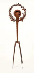Kevin Irvin, Rising II, mixed media sculpture with wood body, metal base and doll head, 78.5 inches tall
