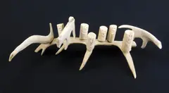 Arviat (Eskimo Point Composition with Figures and Animals caribou antler and by Luke Anowtalik, graphite, 2005, offered Dec 2023