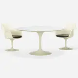 Eero Saarinen, Tulip dining table, model 174W and pair of chairs, model 150, 1956/57, enameled steel, lacquered wood, laminate, fiberglass, vinyl