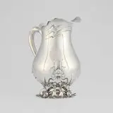 Water pitcher with Art Nouveau-style flower motifs by George W. Shiebler & Co., sold Jul 2026
