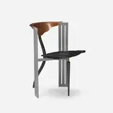 Borek Sipek, Ota Otanek chair, 1988, carved and lacquered wood, enameled steel, copper