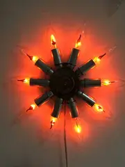 Stella by Giovanni Albanese, 2015, Ferro e lampadine a fiamma, offered Jun 2016