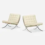 Barcelona chairs, pair by Ludwig Mies van der Rohe, stainless steel, leather, sold Nov 2022
