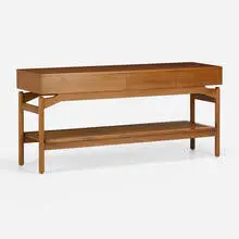 Console table by Greta Magnusson Grossman, c. 1952, American black walnut, caning, sold Nov 2022