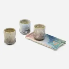 Three tea cups and tray by Charles Higa, 2004, glazed stoneware, sold Nov 2022