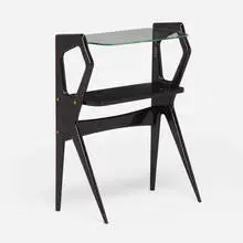 Occasional table by Modern, c. 1950, lacquered wood, glass, brass, sold Nov 2022