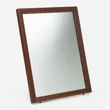Taliesin mirror, model 2002 by Frank Lloyd Wright, c. 1955, mahogany, mirrored glass, sold Nov 2022