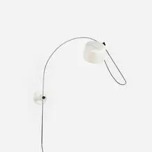 Coupé wall light by Joe Colombo, 1967, enameled aluminum, chrome-plated steel, plastic, sold Oct 2016
