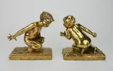 Edith Baretto Parsons, - ''Hide and Seek''- pair of, bronze bookends, both