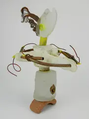 - Totem- by Kevin Lockau, mixed media sculpture- glass, whale bone, copper tubing, wood and fabric. 14 1/2, offered May 2019