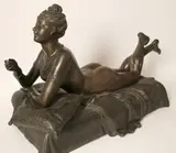 Le Secret d’Odalisque by Louis Hottot, sculpture of a comely maiden reclining on a divan, offered Aug 2016