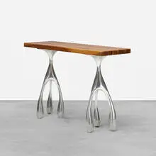 Jordan Mozer, console from Bob San, Chicago, 2006, cast aluminum, stained walnut