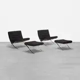 Ludwig Mies van der Rohe, pair of Barcelona chairs and ottomans