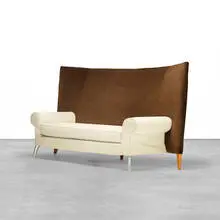 Philippe Starck, Royalton sofa, 1991, upholstery, cast aluminum, cherry