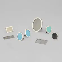 Collection of eight desktop accessories by Tiffany & Co., sterling silver, glass, acrylic, leather, sold Mar 2026