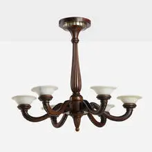 Chandelier by Maurice Dufrène, c. 1925, carved, stained and silvered walnut, alabaster, sold Jan 2026
