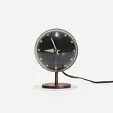 table clock, model 4766 by George Nelson & Associates, 1949, brass, enameled brass, acrylic, enameled aluminum, sold Sep 2016