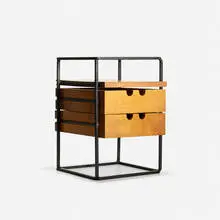 Planner Group desk organizer by Paul McCobb, 1949, stained birch, enameled steel, sold Sep 2016