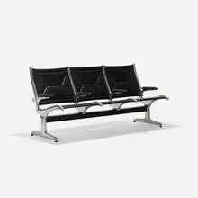 Tandem Sling seating by Charles and Ray Eames, 1962, cast aluminum, vinyl, enameled aluminum, rubber, plastic, sold Sep 2016