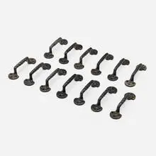 Window sash pulls from the Chicago Stock Exchange Building, set of thirteen by Dankmar Adler and Louis Sullivan, c. 1893, Bower-Barff-finished wrought iron, sold Jan 2026