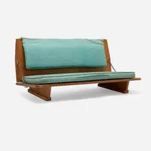 Frank Lloyd Wright, Low bench from Unitarian Meeting House, Madison, 1951, fir plywood, upholstery, steel, brass