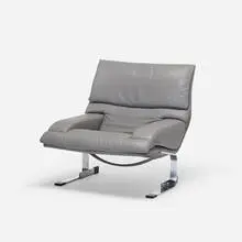 Giovanni Offredi, lounge chair, c. 1970, embossed leather, chrome-plated steel, plastic