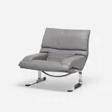 Giovanni Offredi, lounge chair, c. 1970, embossed leather, chrome-plated steel, plastic