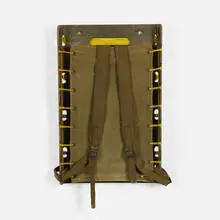 US Army backpack frame by Red Lion Cabinet Co., 1944, lacquered wood, canvas, rope, steel, sold Jul 2016