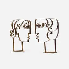 Franz Hagenauer, heads in profile, pair, c. 1970, brass