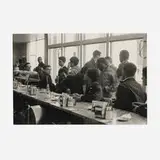 Danny Lyon, SNCC Staff Sit-In, Atlanta, John Lewis behind Mendy Samstein (+ the pastries), Stokely Carmichael standing at right