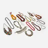 Asian and Indian, Collection of jewelry and accessories, mixed metals, coral, amber, turquoise, wood, hardstone, woven fabric