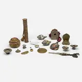 Tibetan and Mongolian, Collection of eighteen artifacts, repoussé and hand-chased mixed metals, copper, silver gilt, shell, painted wood, fabric, leather, woven fabric, turquoise, coral