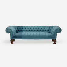 Clarke & Reilly, Chesterfield sofa, embroidered fabric, carved oak