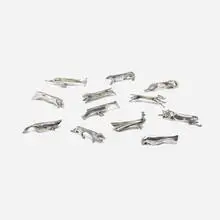 collection of twelve knife rests by Édouard-Marcel Sandoz, c. 1928, silver-plated Galia metal, sold Jul 2016